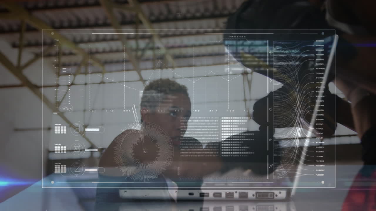 Two women collaborating with laptop in tech loft, interacting with augmented reality graphs