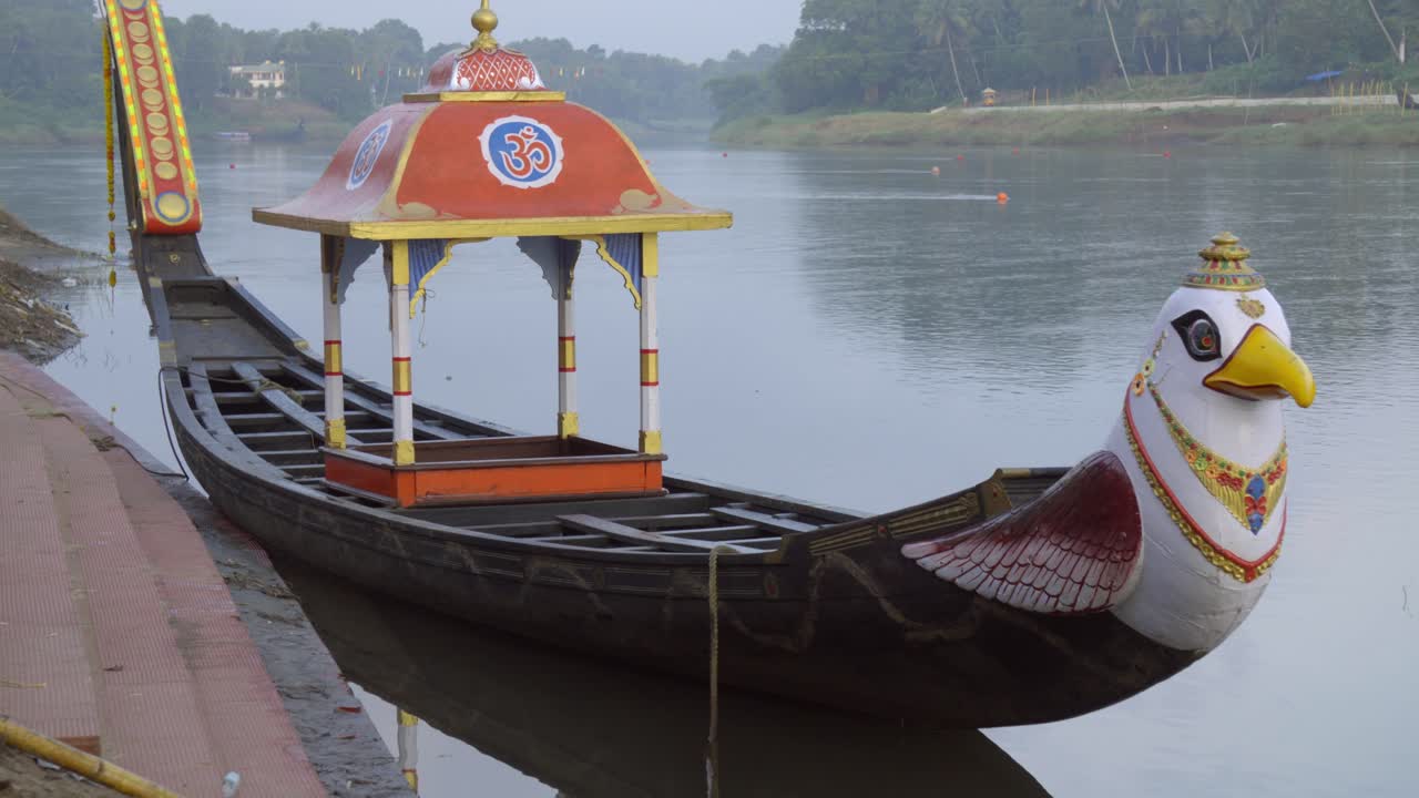 Ornate Traditional Boat on a Calm River in India