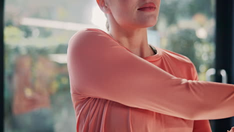 woman stretching her arm