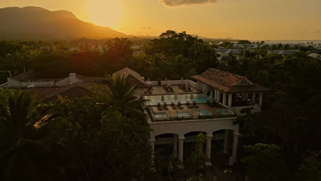 rooftop pools and pavilion of casa colonial beach and spa at sunset