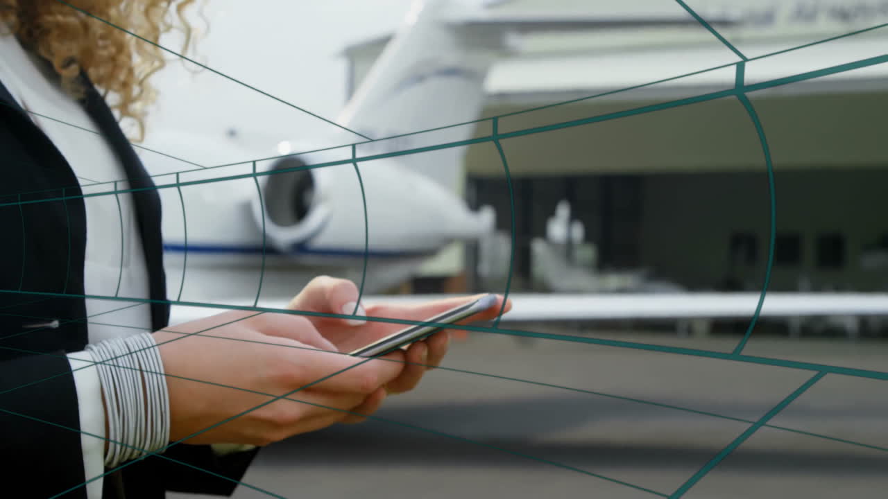 Businesswoman tapping smartphone on tarmac apron, showing animated flight chart and data