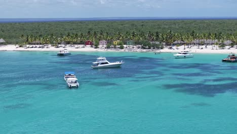 Yacht-Sailing-In-The-Blue-Sea-To-The-Tropical-Beach-On-Catalina-Island-In-Dominican-Republic