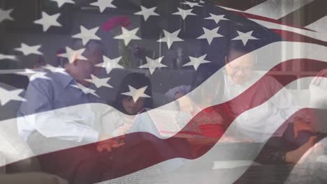 Caucasian-family-with-US-flag-waving-foreground