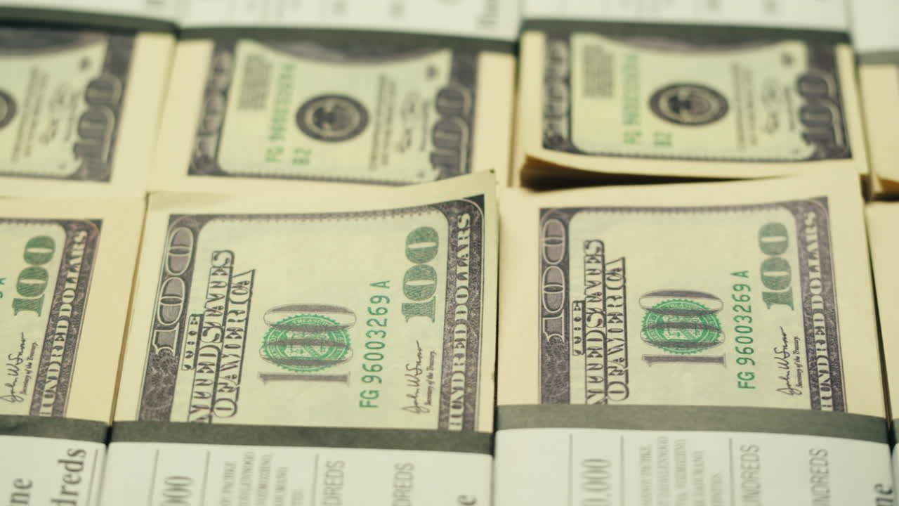 Specialised police officer Counting dollar banknotes in crime lab, conceptual image. High quality 4k footage