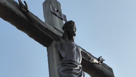 The-Crucifixion-of-Jesus-in-bronze-and-golden-sunlight