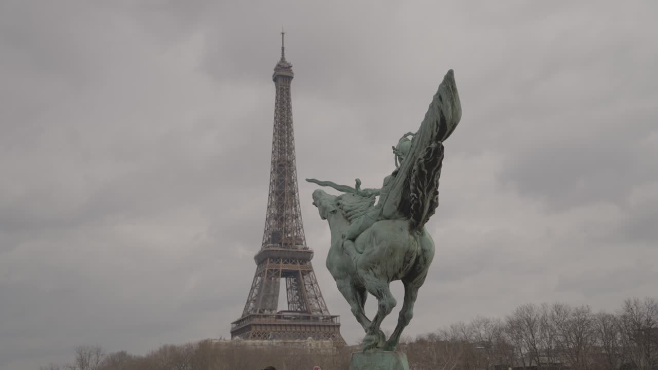 Eiffel Tower and a Statue in Paris