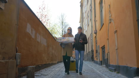 tourists couple looking at city map