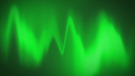 Digital-animation-of-green-heart-rate-monitor-waves-on-black-background