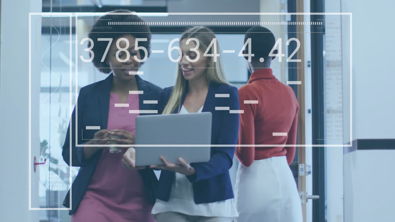 Animation of data processing over diverse female colleagues discussing work in office