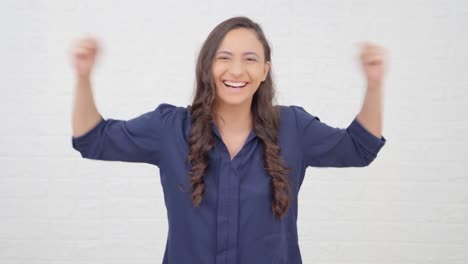 Excited-Indian-girl-cheering-and-having-fun