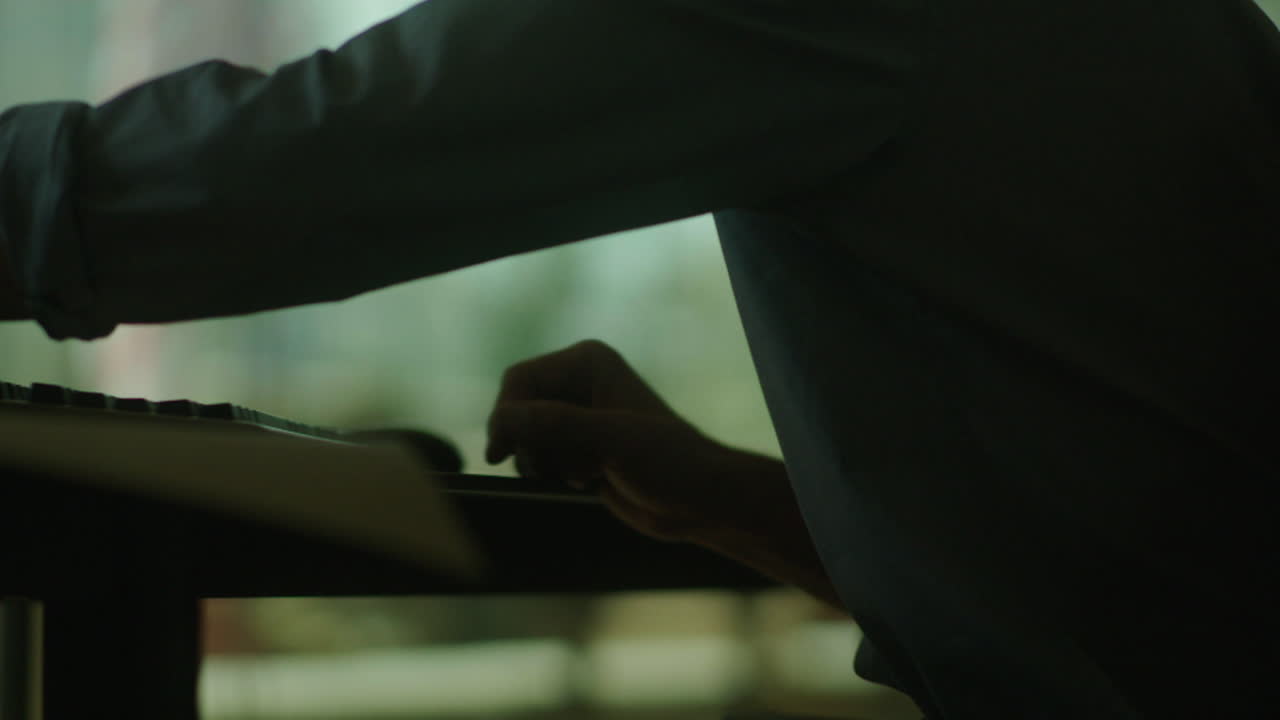 Person Sitting at a Desk in an Office