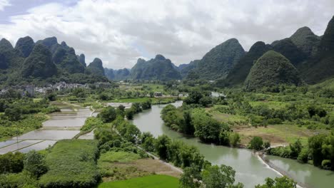 aerial: stunning karst mountain landscape in china, yulong li river countryside