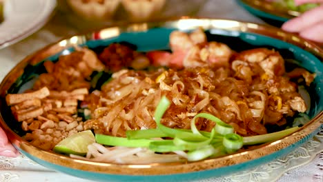 a vibrant dish of pad thai noodles