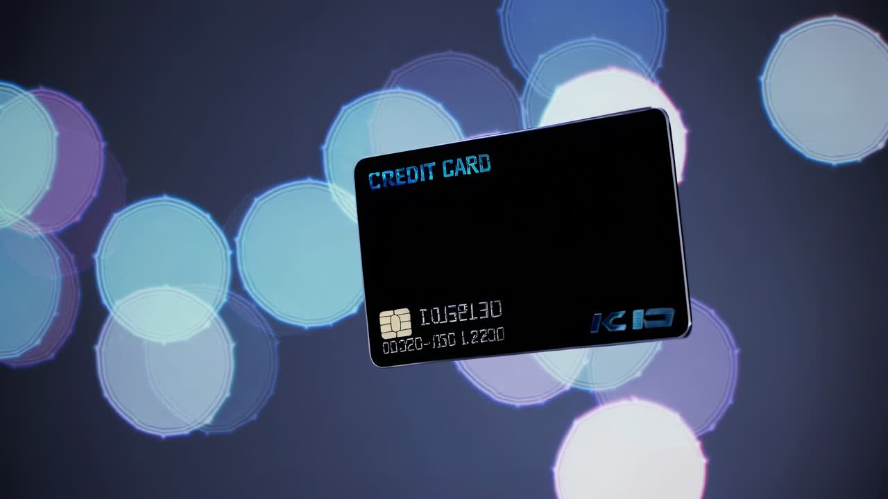 Una tarjeta de crédito flota sobre un fondo bokeh, capturada desde un ángulo bajo
