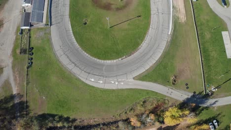 whittemore small track car racing speedway in whittmore , michigan with drone video overhead