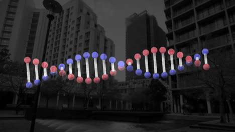 animation of dna strand spinning over a city background.