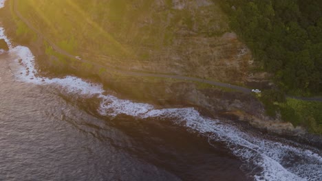 Aerial-view-of-the-Hawaiian-island-Maui's-coastal-road-during-sunset