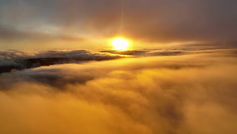 Sunrise-Over-the-Clouds,-beautiful-bright-Aerial-view