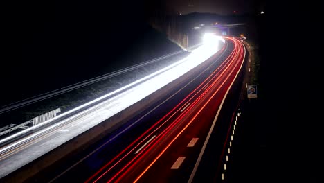 timelapse of vehicle trails on highway