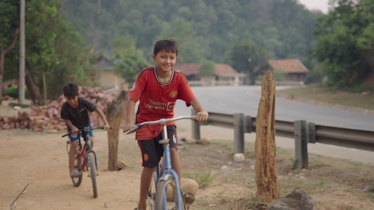Children Riding Bicycles in a Rural Setting