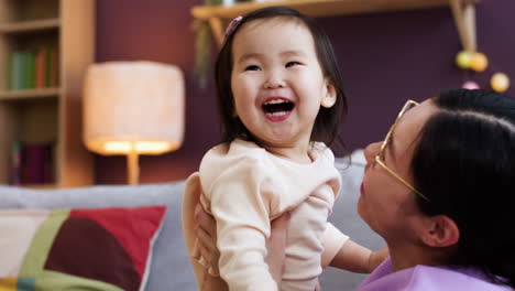 asian mother with her baby