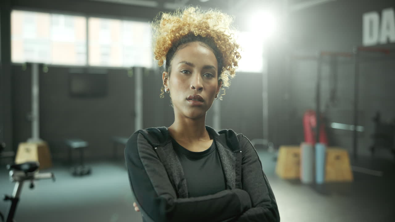 Portrait of a confident woman in a gym