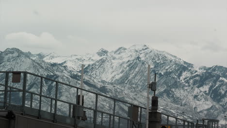 view of towering snow capped mountains from colorado airport