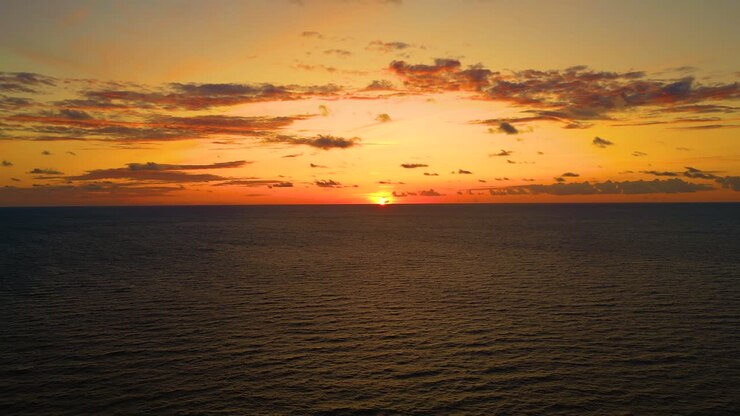 Aerial view of sunset horizon over the sea