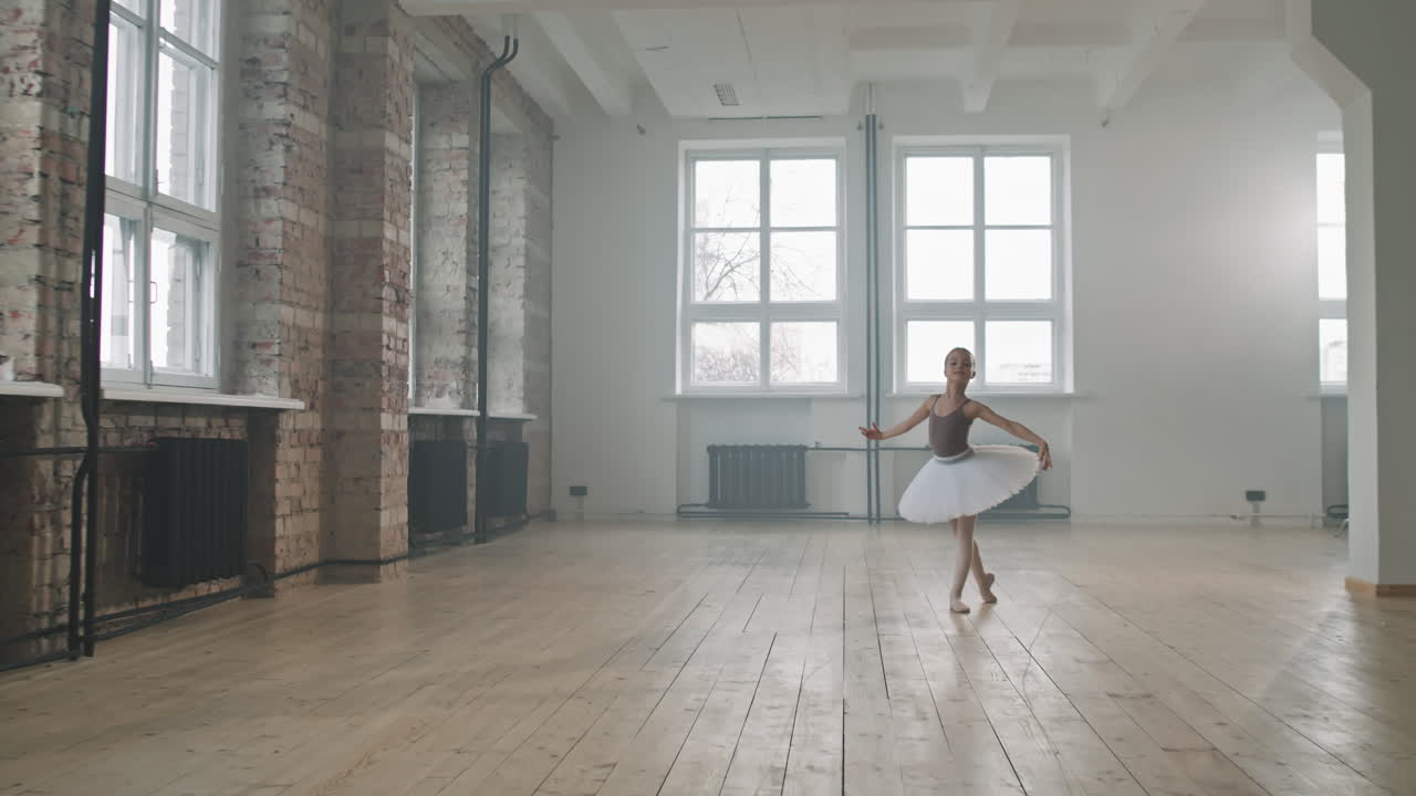 Little Ballerina In Tutu Dancing In Studio