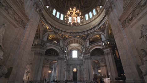 pan up of enormous indoor st pauls cathedral london