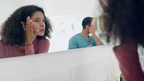 Cream,-bathroom-mirror-and-face-of-woman
