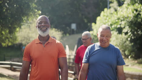 older men enjoying a walk in the park