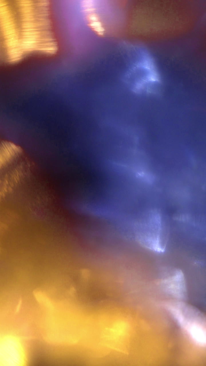 Abstract Golden and Blue Light Leaks with Bokeh Effect