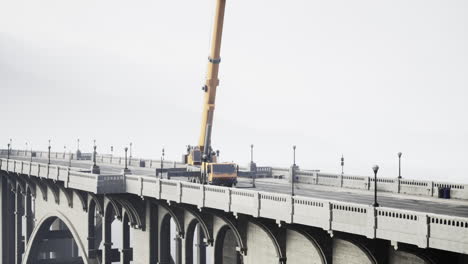 construction on a bridge with crane