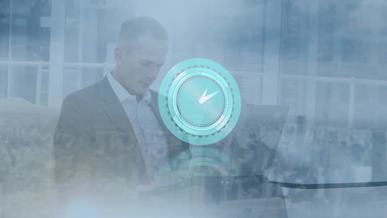 Animation of clock and cityscape over caucasian businessman using laptop