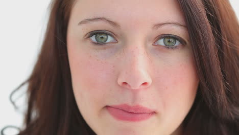 happy brunette chewing