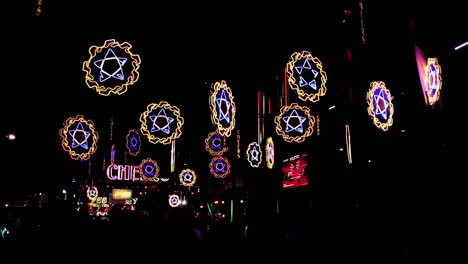 editorial. silhouette of crowd celebrating khmer new year also known as choul chnam thmey and moha sangkranta or just sangkranta in the famous pub street