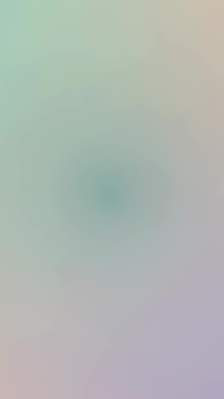 Vertical video: Evolving soft circular blur growing on pastel gradient, frames showing darkening