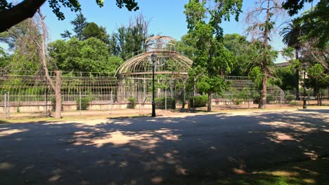 dolly in establishing the greenhouse of quinta normal with victorian touches and art nouveau architecture, santiago chile