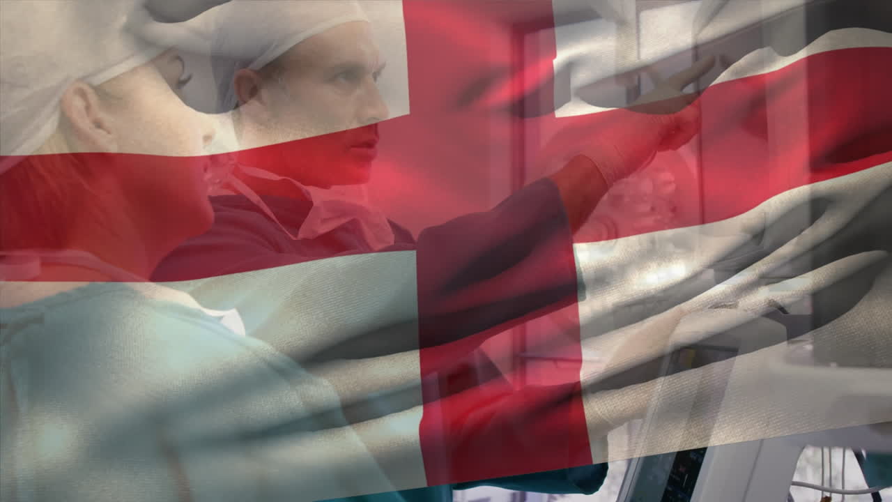 animación de la bandera de inglaterra sobre diversos médicos discutiendo el trabajo en el hospital