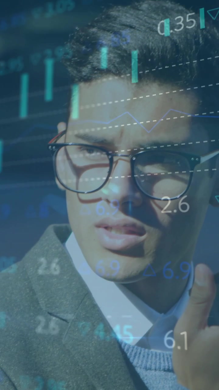 Using smartphone with financial data and stock market animation, businessman analyzing