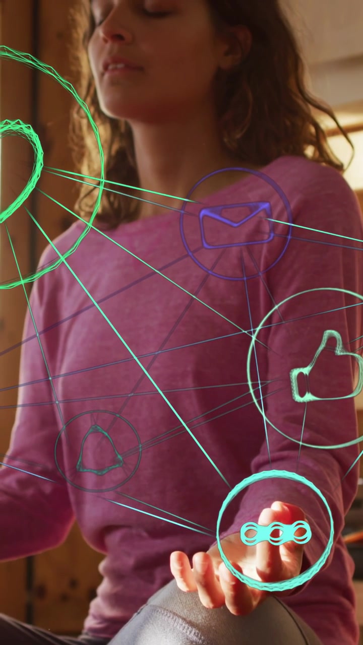 Vertical video: As neon icons appearing, woman sitting guiding link icon into palm for wellness app
