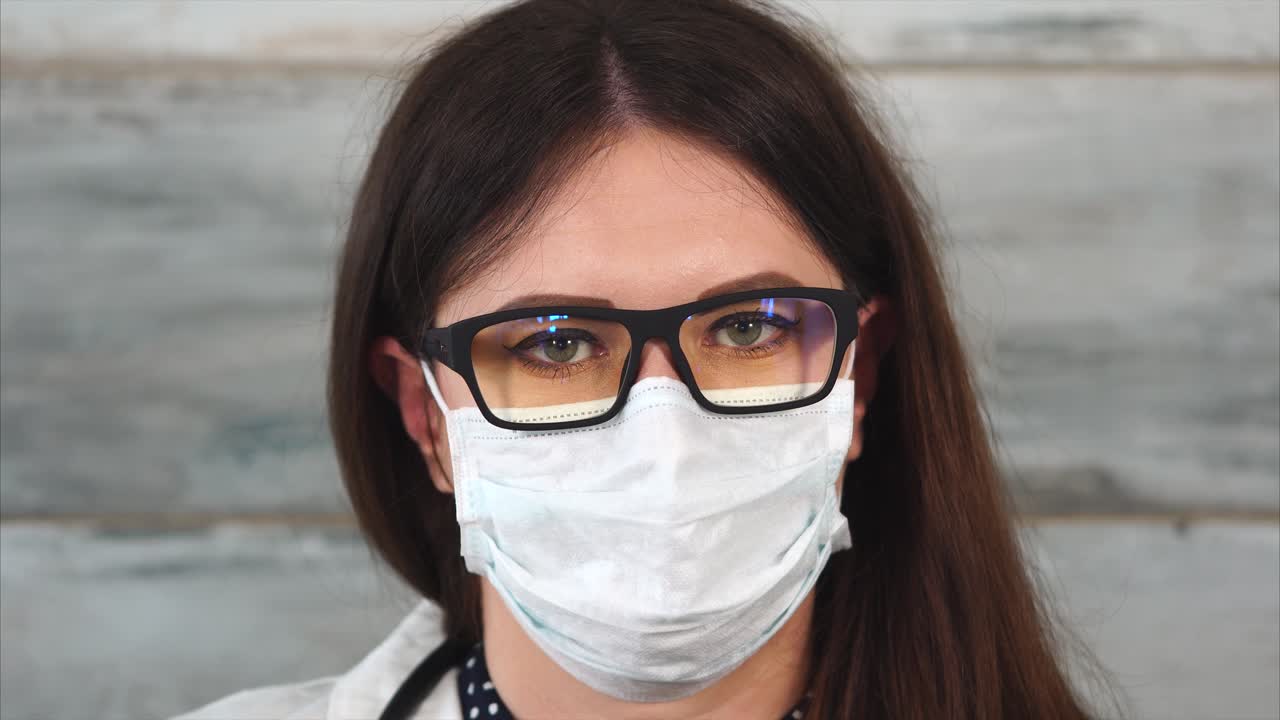 Woman Doctor Wearing Mask and Glasses