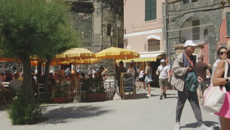 outdoor dine-in restaurants at downtown of monterosso al mare in cinque terre, liguria italy. slow motion shot