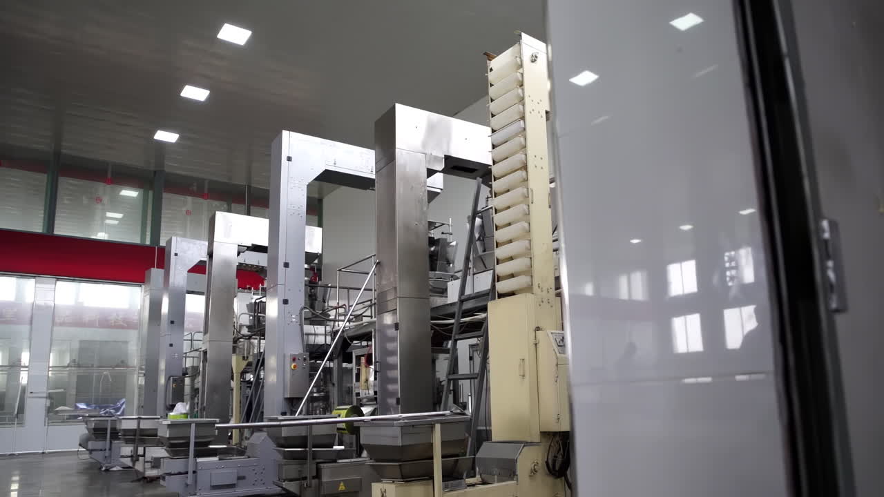 food cake factory on an assembly line, automated Cookies on a Conveyor Belt Production Line in a Factory, ready for packaging and distribution.