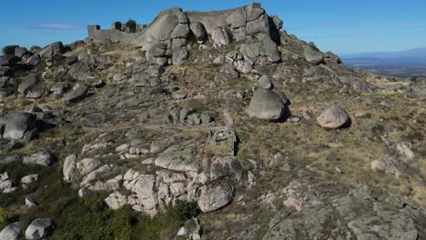 Ancient-construction-on-Monsanto-mountain-and-panoramic-view-of-surrounding-valley,-Portugal