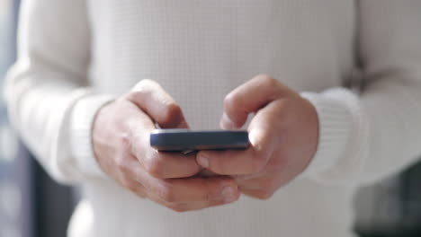 Hands,-man-and-smartphone-for-typing