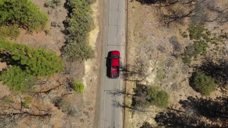 truck carrying mountain bikes is heading to the top of the trail