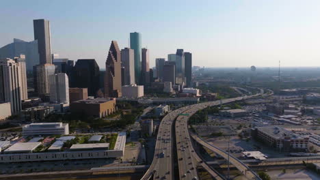 aerial view around i-45 and the westside of downtown houston, usa, golden hour