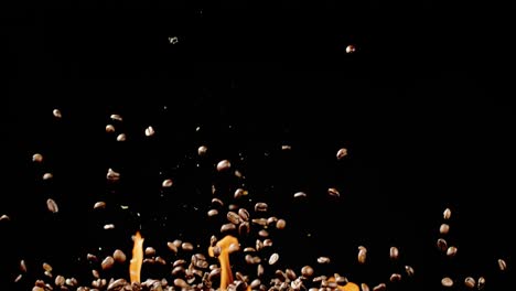 Coffee-Beans-Fly-Through-The-Air-In-Front-Of-Flames